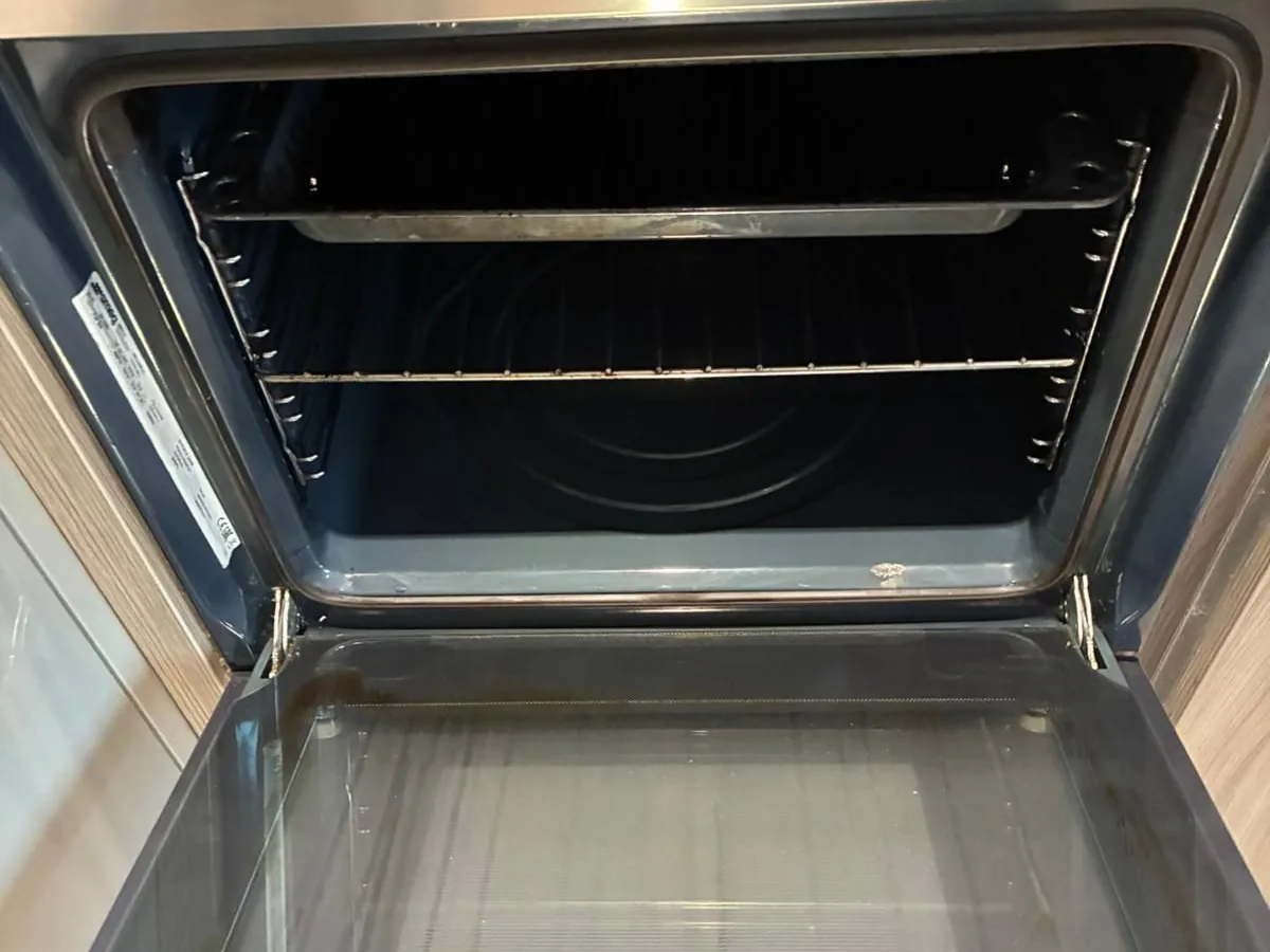 Oven and door glass cleaned to a shine